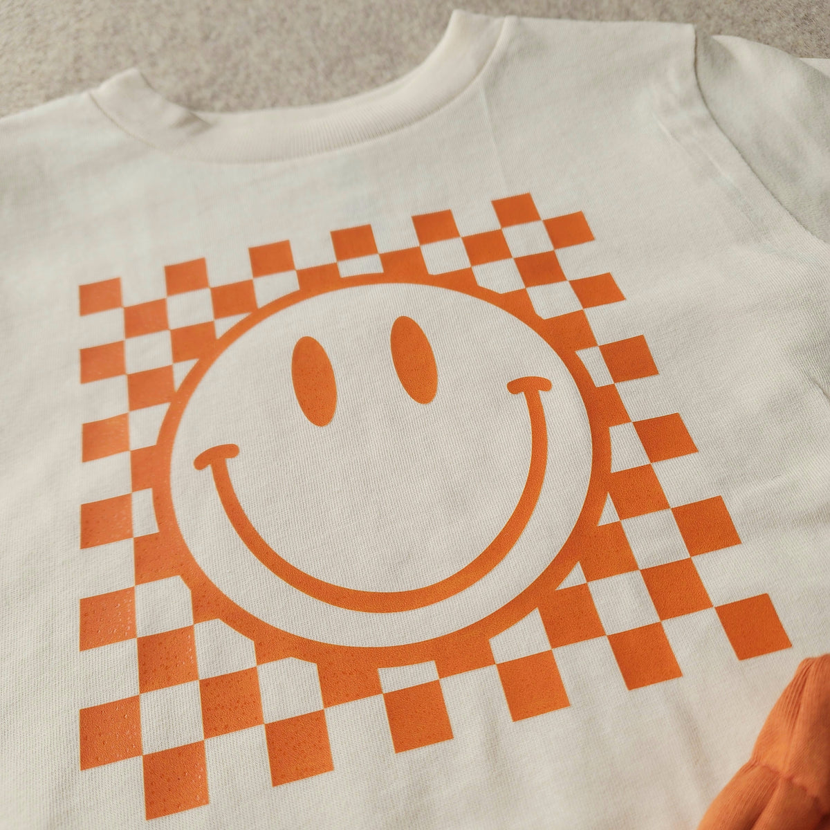 Checkered Smiley Face Tee