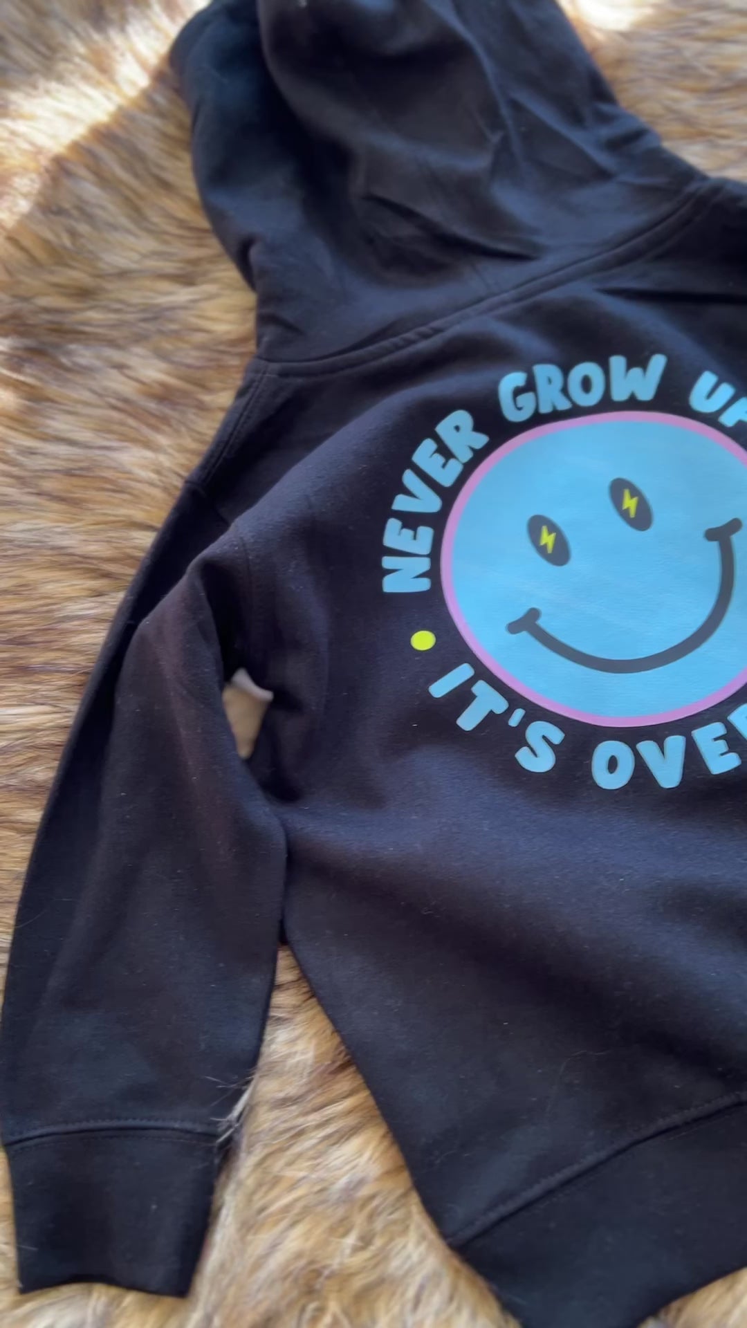 Never Grow Up Sweatshirt